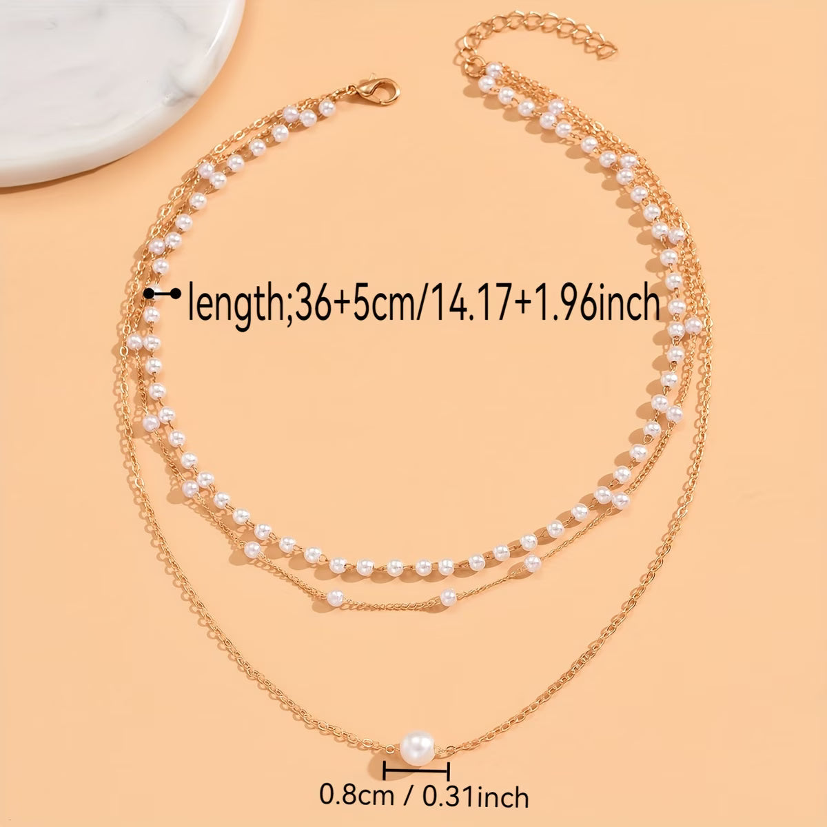 Il set di collane Trinity Pearl Layer