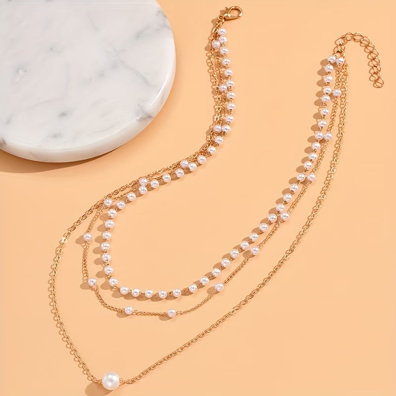 Il set di collane Trinity Pearl Layer