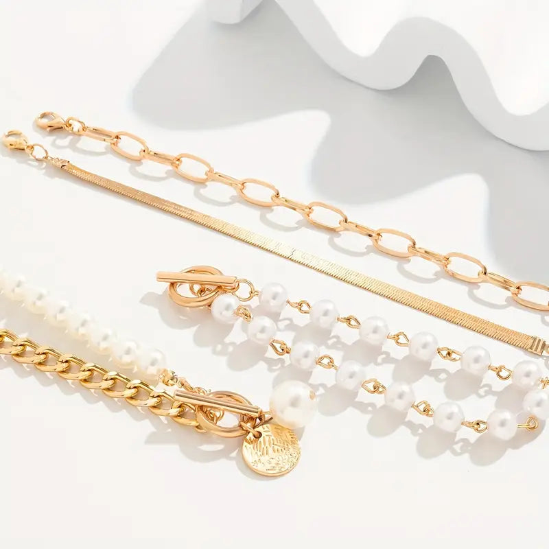 Set di 4 bracciali Chic Gold – Serpente, perle e maglie | Oro
