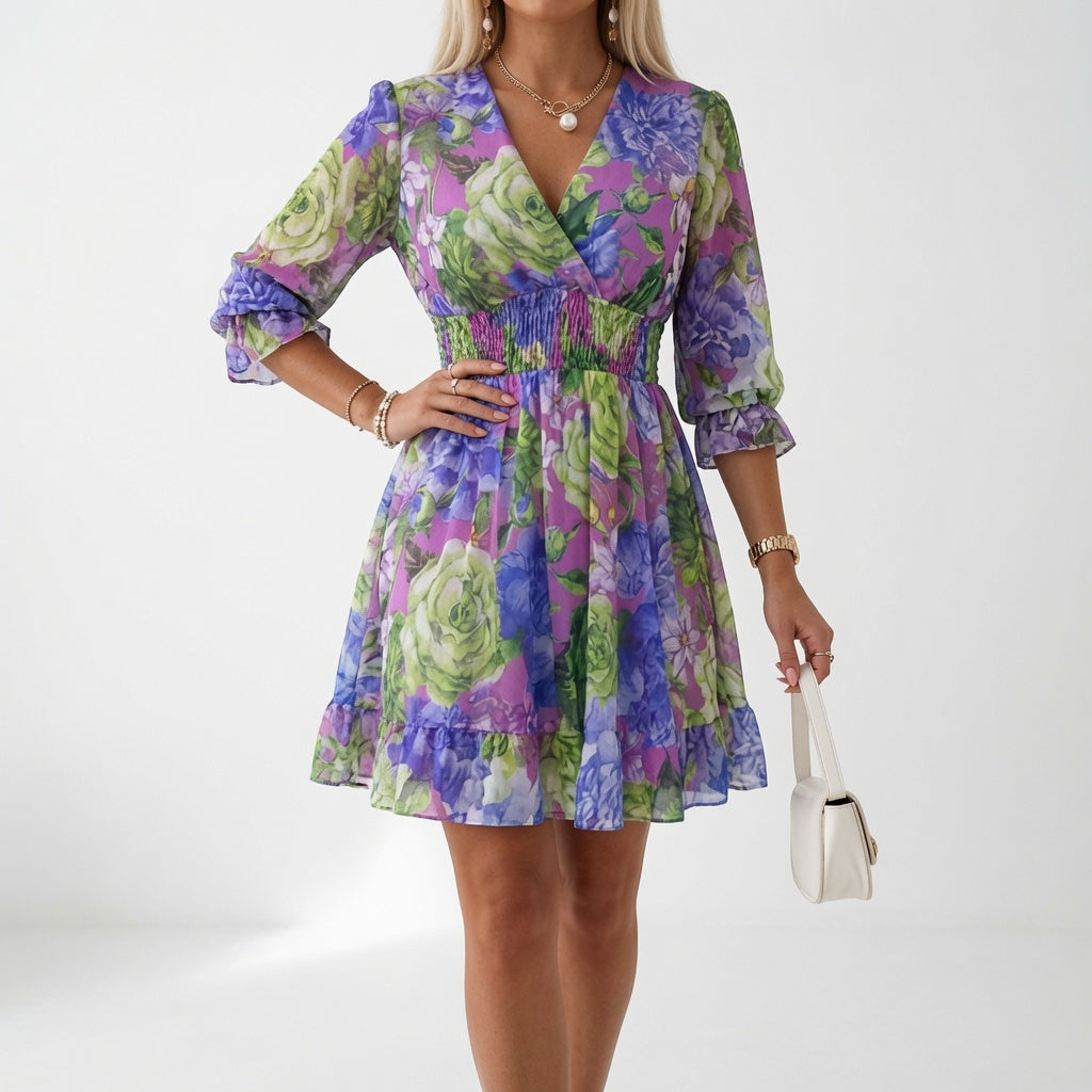 Zaffira | Abito mini floreale con vita smock