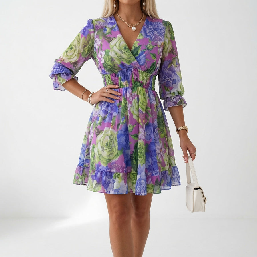 Zaffira | Abito mini floreale con vita smock
